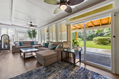 Experience timeless elegance and custom craftsmanship in this on Diamondhead Country Club in Mississippi - for sale on GolfHomes.com, golf home, golf lot