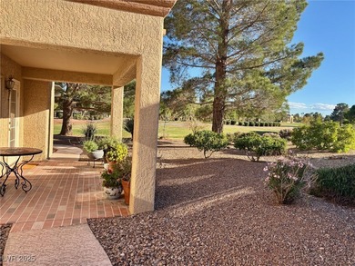 From the front courtyd entry to the views accessible from inside on Highland Falls Golf Club in Nevada - for sale on GolfHomes.com, golf home, golf lot