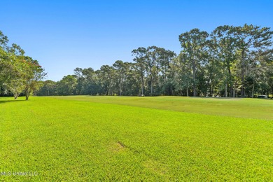 Experience timeless elegance and custom craftsmanship in this on Diamondhead Country Club in Mississippi - for sale on GolfHomes.com, golf home, golf lot