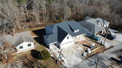New construction on a .40 acre wooded lot! Located next to on Bella Vista Country Club - Scottsdale in Arkansas - for sale on GolfHomes.com, golf home, golf lot