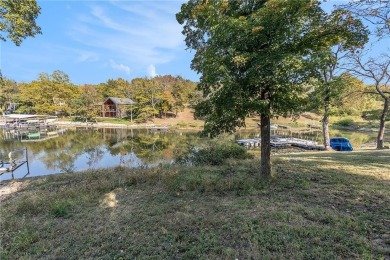 This lake front home is in the sought after Sugar Valley Lakes on Sugar Valley Lakes Golf Course in Kansas - for sale on GolfHomes.com, golf home, golf lot