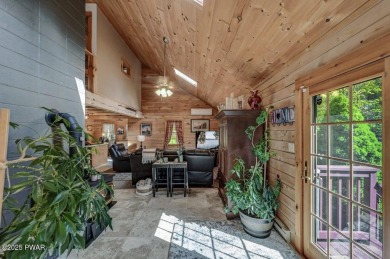 This gorgeous log home truly embraces the ''life in the on The Hideout Golf in Pennsylvania - for sale on GolfHomes.com, golf home, golf lot