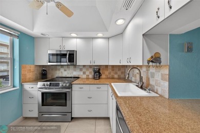 BRING YOUR BOAT to this wonderful hidden gem on deep water in on Coral Ridge Country Club in Florida - for sale on GolfHomes.com, golf home, golf lot