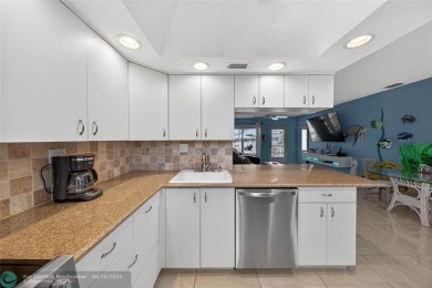 BRING YOUR BOAT to this wonderful hidden gem on deep water in on Coral Ridge Country Club in Florida - for sale on GolfHomes.com, golf home, golf lot