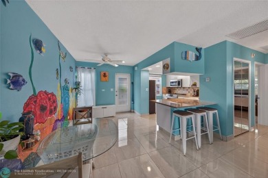 BRING YOUR BOAT to this wonderful hidden gem on deep water in on Coral Ridge Country Club in Florida - for sale on GolfHomes.com, golf home, golf lot