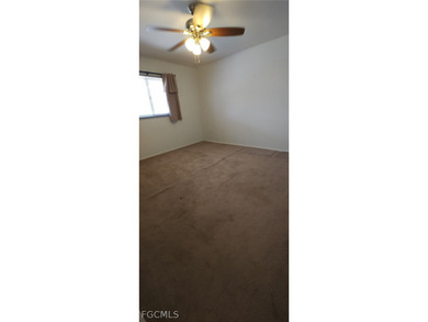 This cozy 3 bedroom, 2 bathroom pool home located in SW Cape on Royal Tee Country Club in Florida - for sale on GolfHomes.com, golf home, golf lot