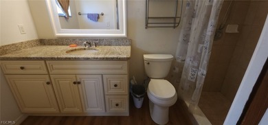 This cozy 3 bedroom, 2 bathroom pool home located in SW Cape on Royal Tee Country Club in Florida - for sale on GolfHomes.com, golf home, golf lot