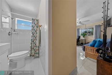 BRING YOUR BOAT to this wonderful hidden gem on deep water in on Coral Ridge Country Club in Florida - for sale on GolfHomes.com, golf home, golf lot
