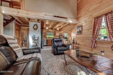 This gorgeous log home truly embraces the ''life in the on The Hideout Golf in Pennsylvania - for sale on GolfHomes.com, golf home, golf lot