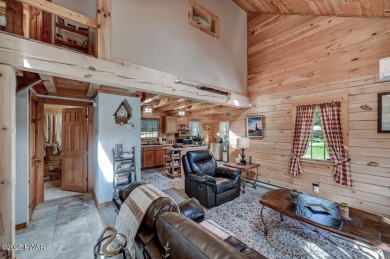 This gorgeous log home truly embraces the ''life in the on The Hideout Golf in Pennsylvania - for sale on GolfHomes.com, golf home, golf lot