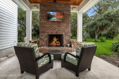 PRICED TO SELL! This stunning custom built golf course home is on The Palencia Club in Florida - for sale on GolfHomes.com, golf home, golf lot