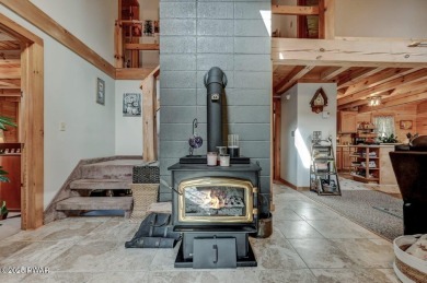 This gorgeous log home truly embraces the ''life in the on The Hideout Golf in Pennsylvania - for sale on GolfHomes.com, golf home, golf lot