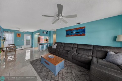 BRING YOUR BOAT to this wonderful hidden gem on deep water in on Coral Ridge Country Club in Florida - for sale on GolfHomes.com, golf home, golf lot