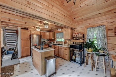 This gorgeous log home truly embraces the ''life in the on The Hideout Golf in Pennsylvania - for sale on GolfHomes.com, golf home, golf lot