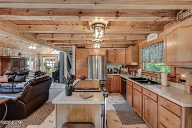 This gorgeous log home truly embraces the ''life in the on The Hideout Golf in Pennsylvania - for sale on GolfHomes.com, golf home, golf lot