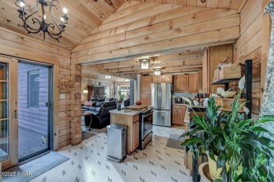 This gorgeous log home truly embraces the ''life in the on The Hideout Golf in Pennsylvania - for sale on GolfHomes.com, golf home, golf lot