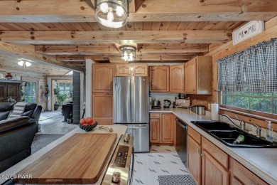 This gorgeous log home truly embraces the ''life in the on The Hideout Golf in Pennsylvania - for sale on GolfHomes.com, golf home, golf lot