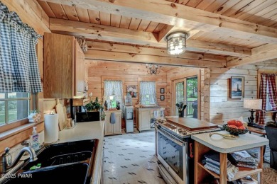 This gorgeous log home truly embraces the ''life in the on The Hideout Golf in Pennsylvania - for sale on GolfHomes.com, golf home, golf lot