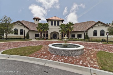 PRICED TO SELL! This stunning custom built golf course home is on The Palencia Club in Florida - for sale on GolfHomes.com, golf home, golf lot