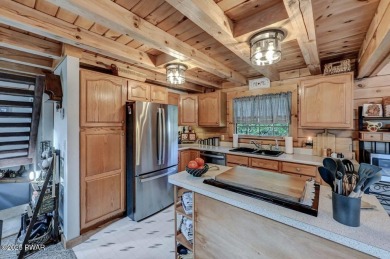 This gorgeous log home truly embraces the ''life in the on The Hideout Golf in Pennsylvania - for sale on GolfHomes.com, golf home, golf lot