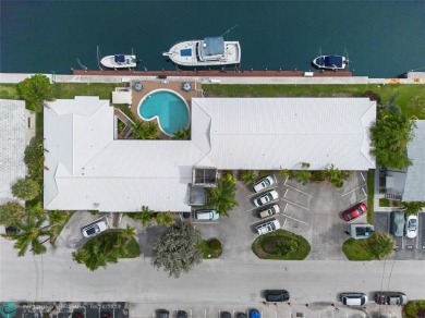 BRING YOUR BOAT to this wonderful hidden gem on deep water in on Coral Ridge Country Club in Florida - for sale on GolfHomes.com, golf home, golf lot