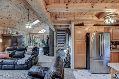This gorgeous log home truly embraces the ''life in the on The Hideout Golf in Pennsylvania - for sale on GolfHomes.com, golf home, golf lot