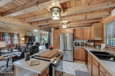 This gorgeous log home truly embraces the ''life in the on The Hideout Golf in Pennsylvania - for sale on GolfHomes.com, golf home, golf lot