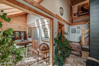 This gorgeous log home truly embraces the ''life in the on The Hideout Golf in Pennsylvania - for sale on GolfHomes.com, golf home, golf lot