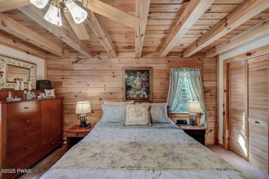 This gorgeous log home truly embraces the ''life in the on The Hideout Golf in Pennsylvania - for sale on GolfHomes.com, golf home, golf lot