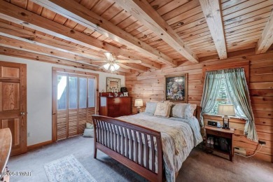 This gorgeous log home truly embraces the ''life in the on The Hideout Golf in Pennsylvania - for sale on GolfHomes.com, golf home, golf lot