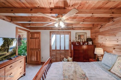 This gorgeous log home truly embraces the ''life in the on The Hideout Golf in Pennsylvania - for sale on GolfHomes.com, golf home, golf lot
