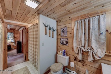 This gorgeous log home truly embraces the ''life in the on The Hideout Golf in Pennsylvania - for sale on GolfHomes.com, golf home, golf lot
