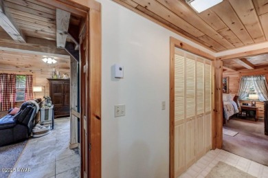 This gorgeous log home truly embraces the ''life in the on The Hideout Golf in Pennsylvania - for sale on GolfHomes.com, golf home, golf lot