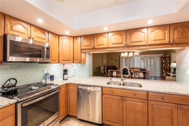 Located in the desirable East Lake area, this updated 2-bedroom on Tarpon Woods Golf Club in Florida - for sale on GolfHomes.com, golf home, golf lot