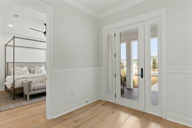 The Ficus Model Home built by Huff Homes, is a popular on Origins Golf Club in Florida - for sale on GolfHomes.com, golf home, golf lot