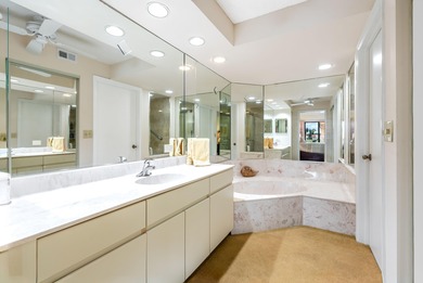 Beautiful views and an exceptional location define this elegant on Gleneagles Golf and Country Club in Florida - for sale on GolfHomes.com, golf home, golf lot