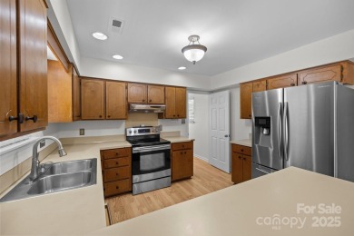 Welcome to this beautifully maintained traditional home in on Raintree Country Club in North Carolina - for sale on GolfHomes.com, golf home, golf lot