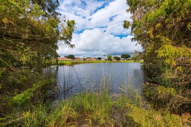 Beautiful views and an exceptional location define this elegant on Gleneagles Golf and Country Club in Florida - for sale on GolfHomes.com, golf home, golf lot