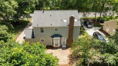 Welcome to this beautifully maintained traditional home in on Raintree Country Club in North Carolina - for sale on GolfHomes.com, golf home, golf lot