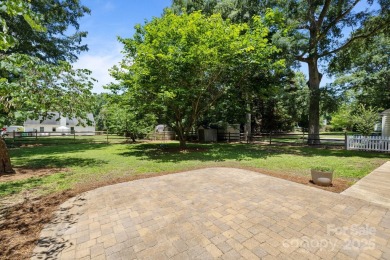 Welcome to this beautifully maintained traditional home in on Raintree Country Club in North Carolina - for sale on GolfHomes.com, golf home, golf lot
