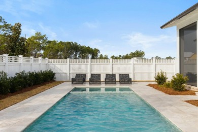 The Ficus Model Home built by Huff Homes, is a popular on Origins Golf Club in Florida - for sale on GolfHomes.com, golf home, golf lot
