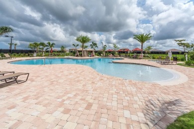 Tastefully decorated and TURN-KEY FURNISHED this popular 2 on River Strand Golf and Country Club At Heritage Harbour  in Florida - for sale on GolfHomes.com, golf home, golf lot