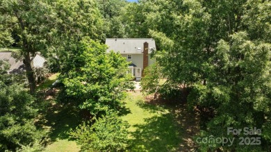 Welcome to this beautifully maintained traditional home in on Raintree Country Club in North Carolina - for sale on GolfHomes.com, golf home, golf lot