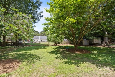 Welcome to this beautifully maintained traditional home in on Raintree Country Club in North Carolina - for sale on GolfHomes.com, golf home, golf lot