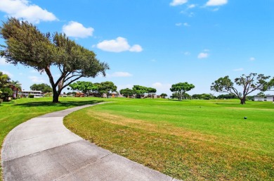 Embrace the captivating charm and modern convenience of this on Kings Point Golf -Flanders Way in Florida - for sale on GolfHomes.com, golf home, golf lot