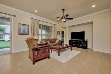 This beautifully maintained corner lot half duplex home is on Wildhorse Golf Club of Robson Ranch in Texas - for sale on GolfHomes.com, golf home, golf lot