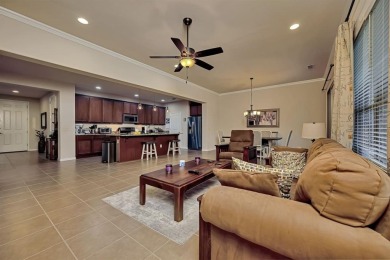 This beautifully maintained corner lot half duplex home is on Wildhorse Golf Club of Robson Ranch in Texas - for sale on GolfHomes.com, golf home, golf lot