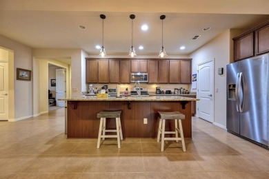 This beautifully maintained corner lot half duplex home is on Wildhorse Golf Club of Robson Ranch in Texas - for sale on GolfHomes.com, golf home, golf lot