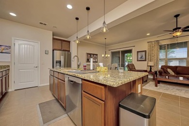 This beautifully maintained corner lot half duplex home is on Wildhorse Golf Club of Robson Ranch in Texas - for sale on GolfHomes.com, golf home, golf lot