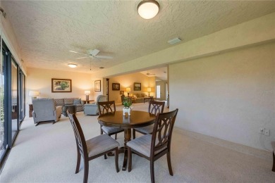 Tranquil, spotless, and effortlessly inviting, this on Palm Aire Country Club of Sarasota in Florida - for sale on GolfHomes.com, golf home, golf lot